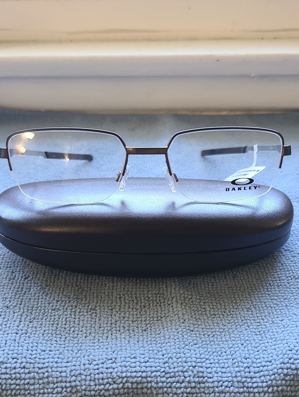 New & Authentic Oakley Frames Rimless Model-0X3100, Silver, Size 55-19-140